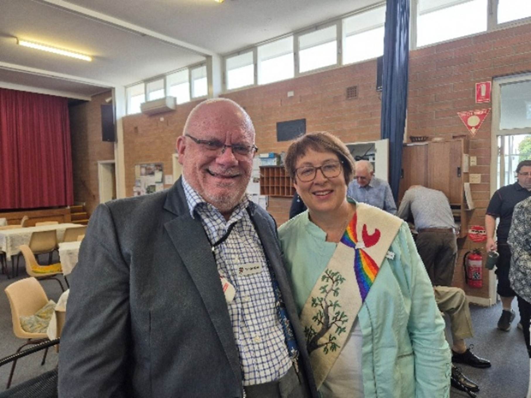 A person and person smiling at camera

AI-generated content may be incorrect.