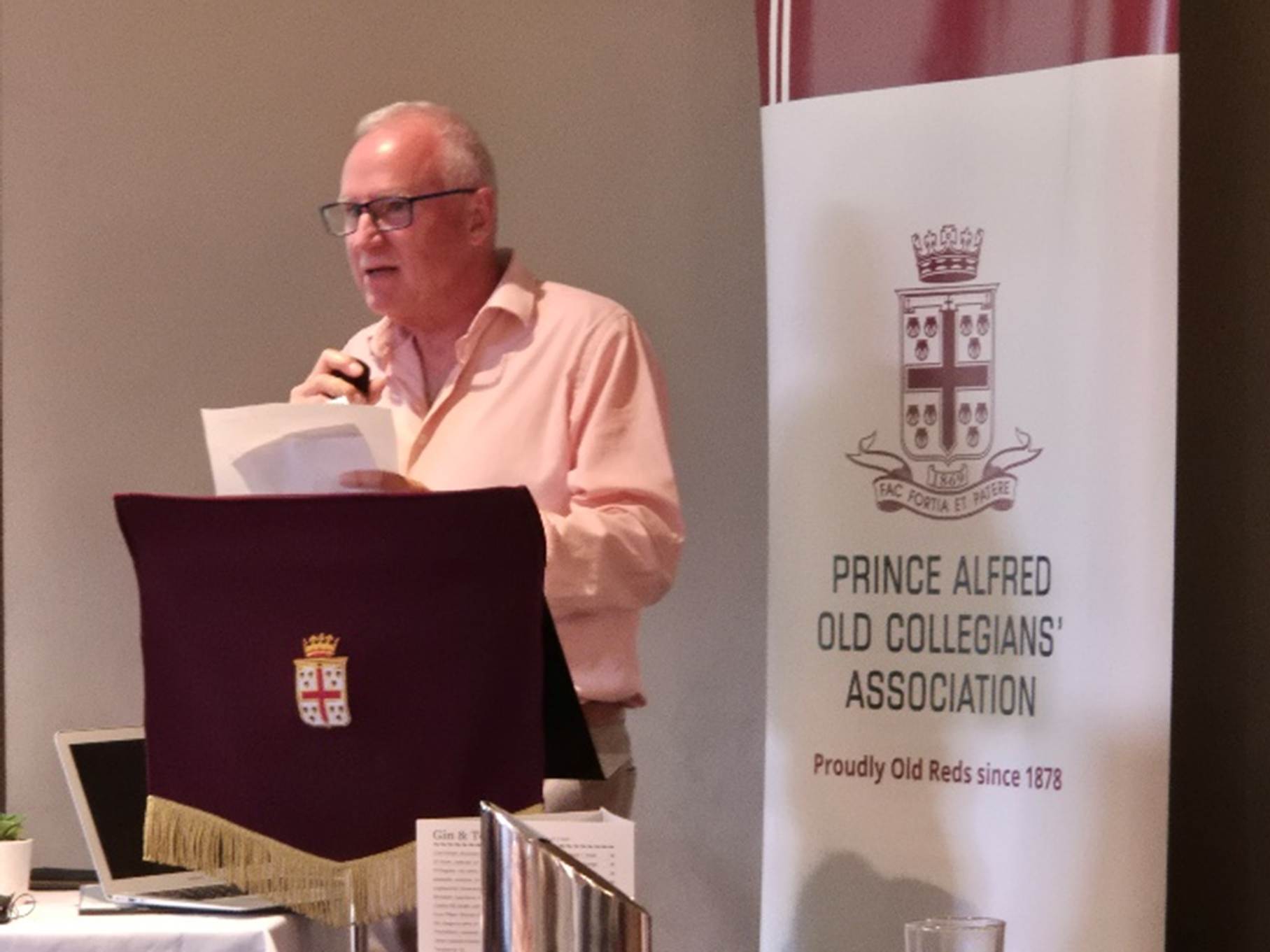 A person standing in front of a banner

AI-generated content may be incorrect.